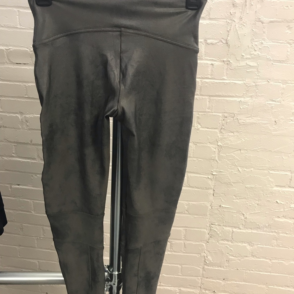 Faux leather leggings .